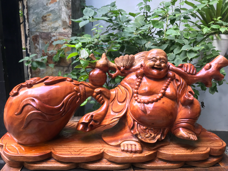 Tượng phật Di Lặc kéo bị tiền